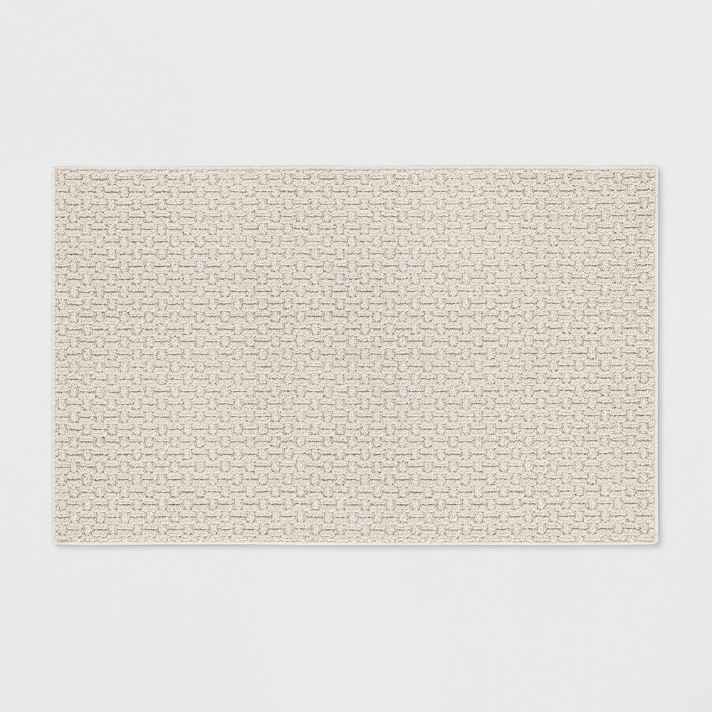 2'6inx3'10in/30inx46in Solid Washable Tufted Accent Rug Tan - Made By Design™